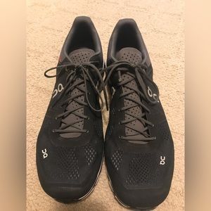 On Cloud running shoe. Color Black. Size Mens 12.5